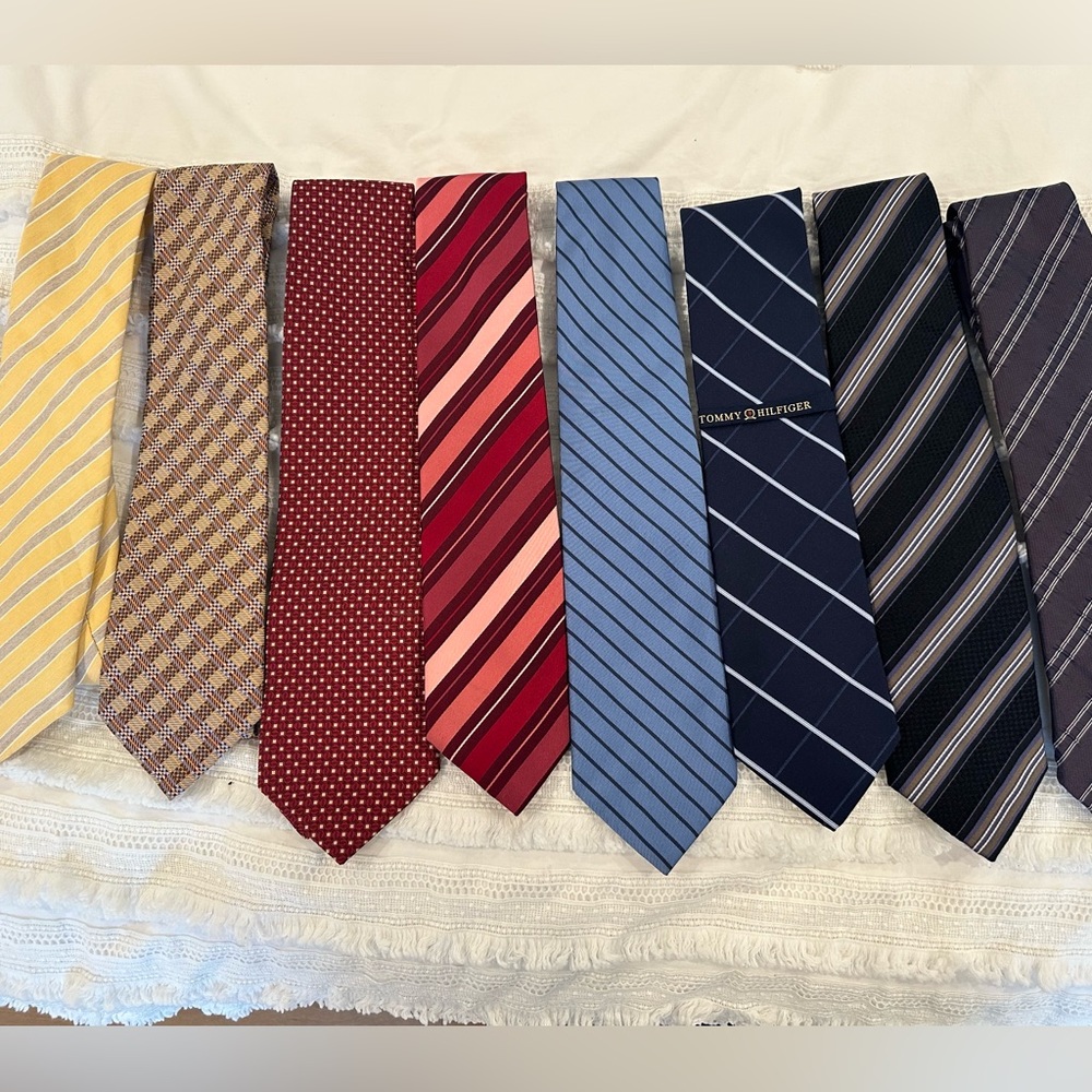 A lot of eight men’s ties. Canali, BOSS, Georgio Armani, and more.